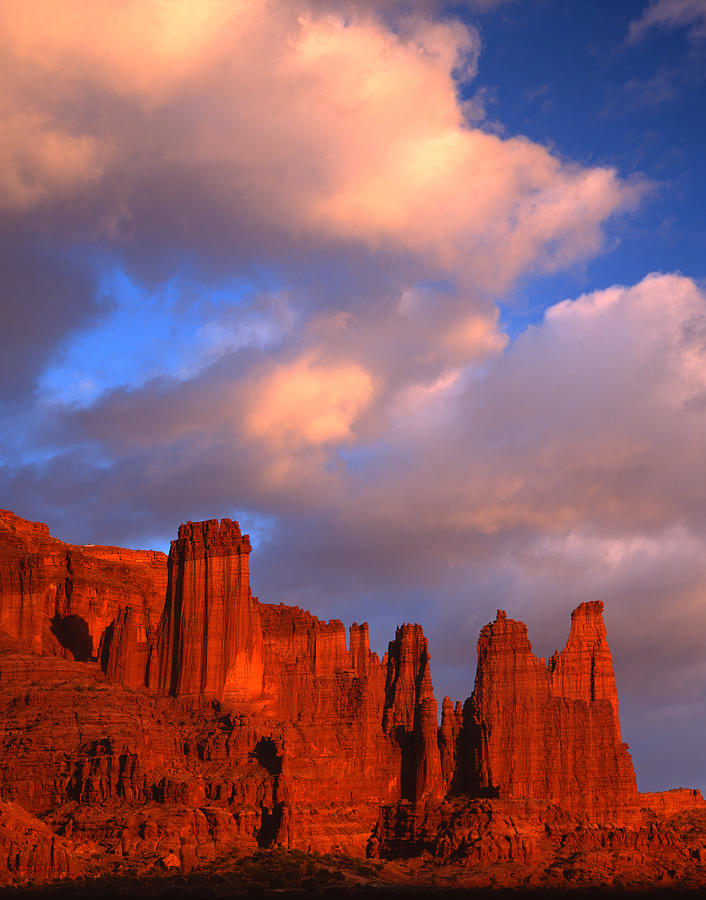 Sunset on Fisher Towers Photograph by Ray Mathis