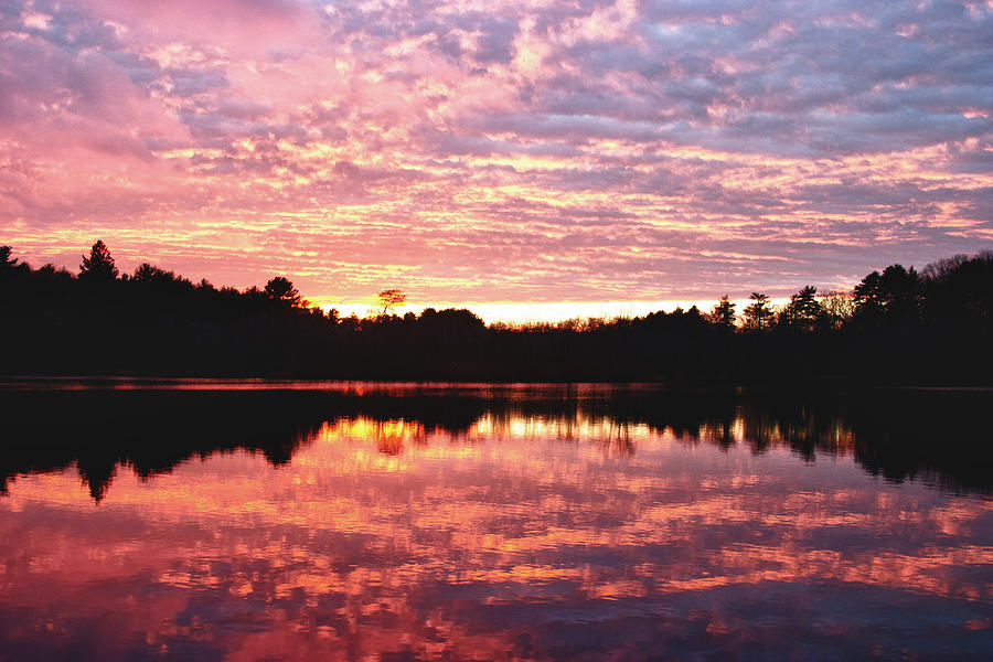 Sunset on rock pond Photograph by Jeff Folger