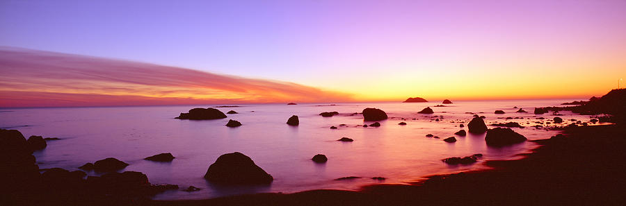 Nature Photograph - Sunset On Rocky Pacific Shoreline by Panoramic Images