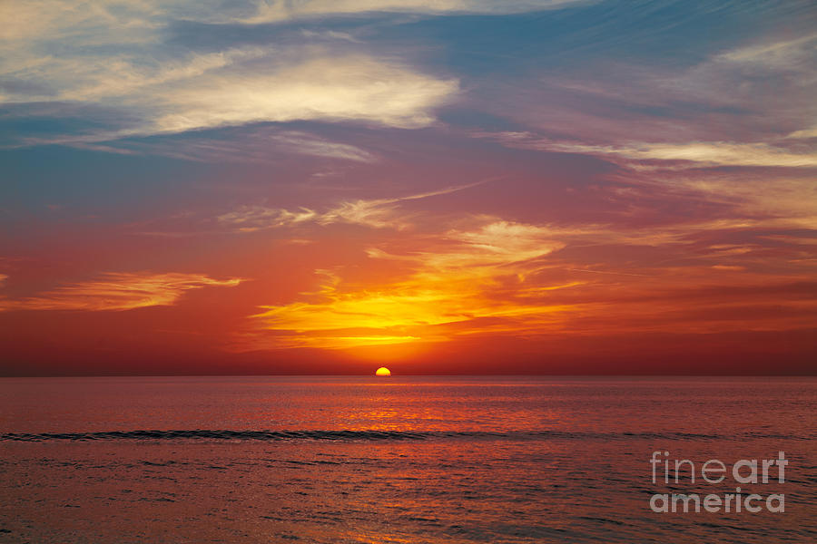 Sunset Photograph - Sunset on the beach. by Yaromir Mlynski