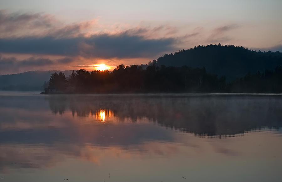 Sunset on the lake Photograph by Marek Poplawski