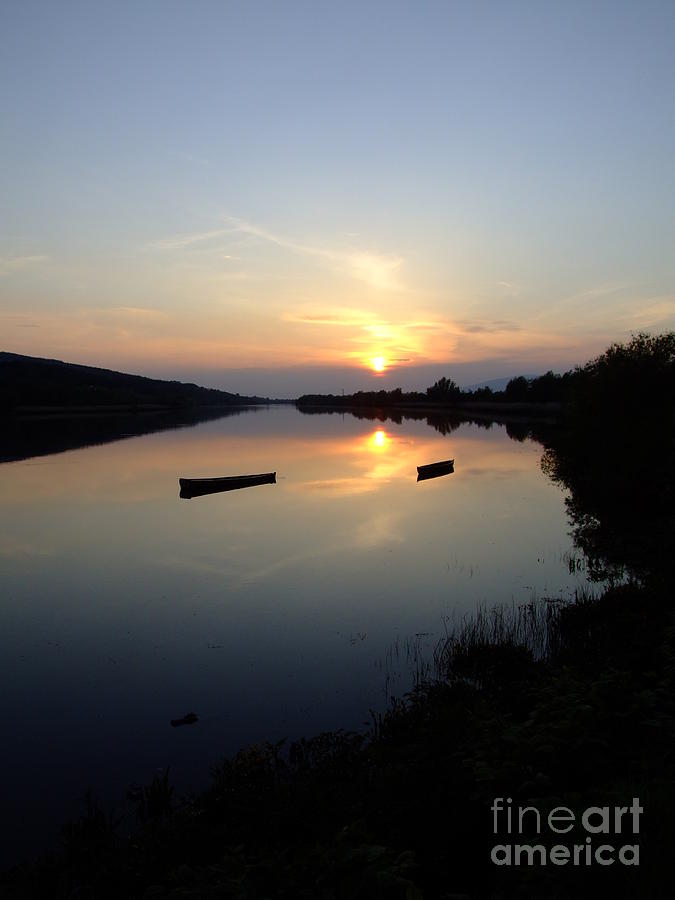 Sunset Photograph - Sunset on the river Suir by Joe Cashin