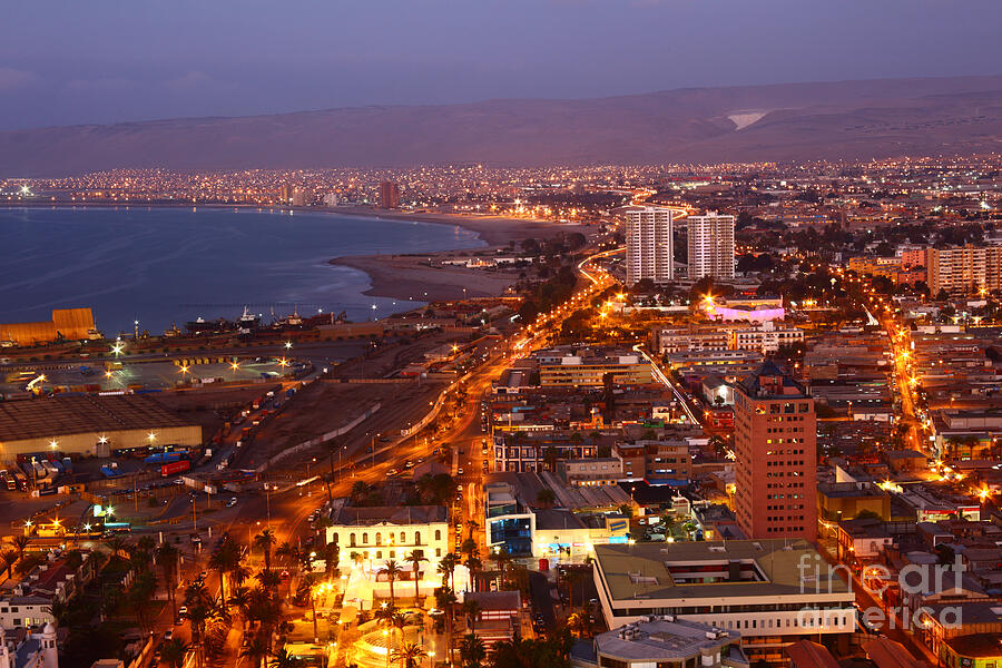 Arica city lights at twilight Chile Photograph by James Brunker