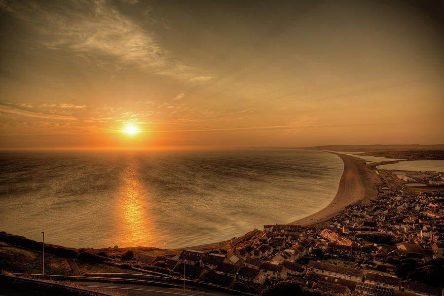 Sunset Over Chesil Beach by Maurice Ford