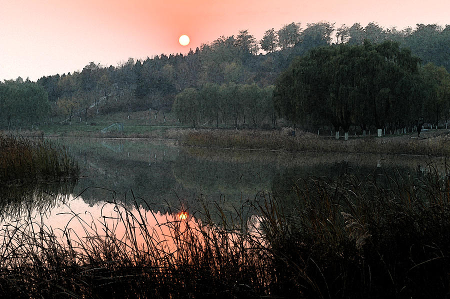 Sunset over lake Photograph by Yue Wang