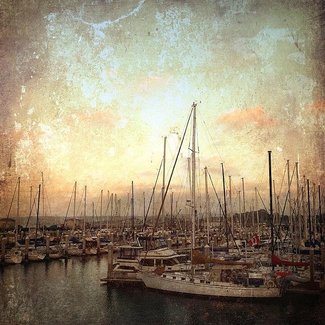 Boat Photograph - Sunset over Monterey Harbor by Charlene Mitchell