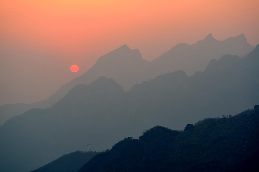 Sunset over Mountains Photograph by Songquan Deng
