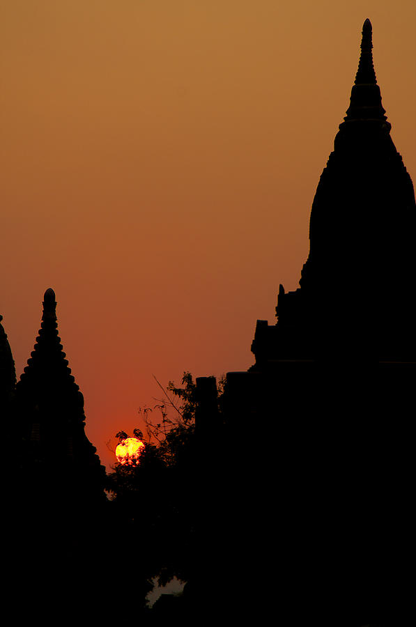 Sunset over Pagoda Photograph by Arj Munoz