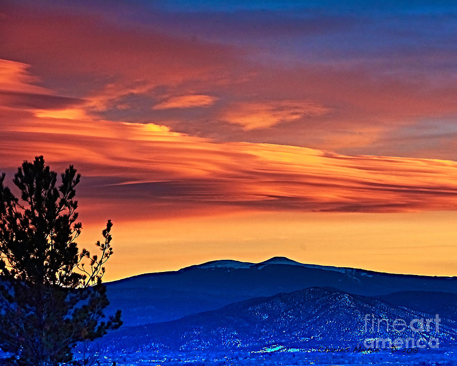 Sunset over Taos Photograph by Charles Muhle