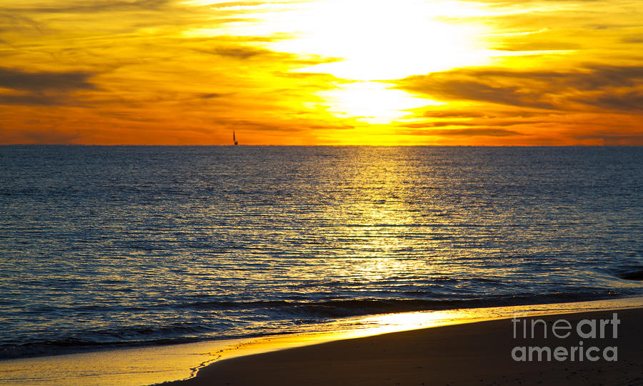 Sunset over the Atlantic Ocean off Southport North Carolina with Photograph by ELITE IMAGE