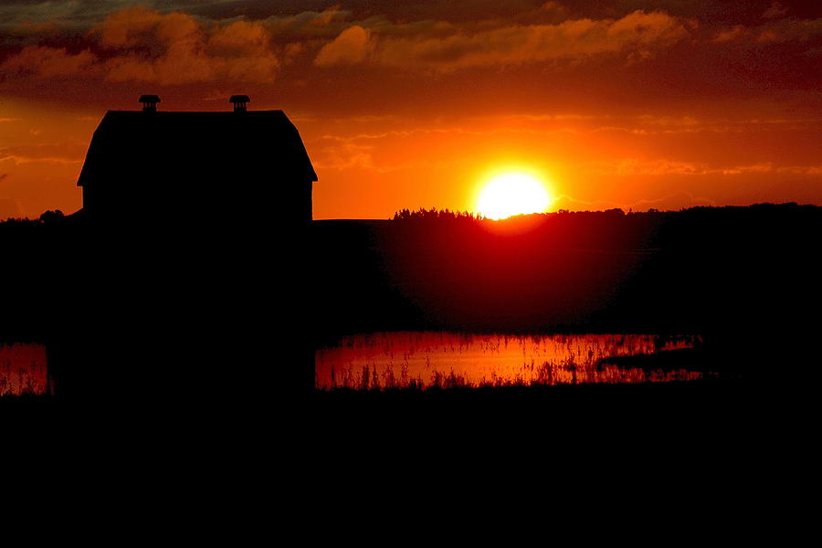 Sunset over the barn Photograph by David Matthews