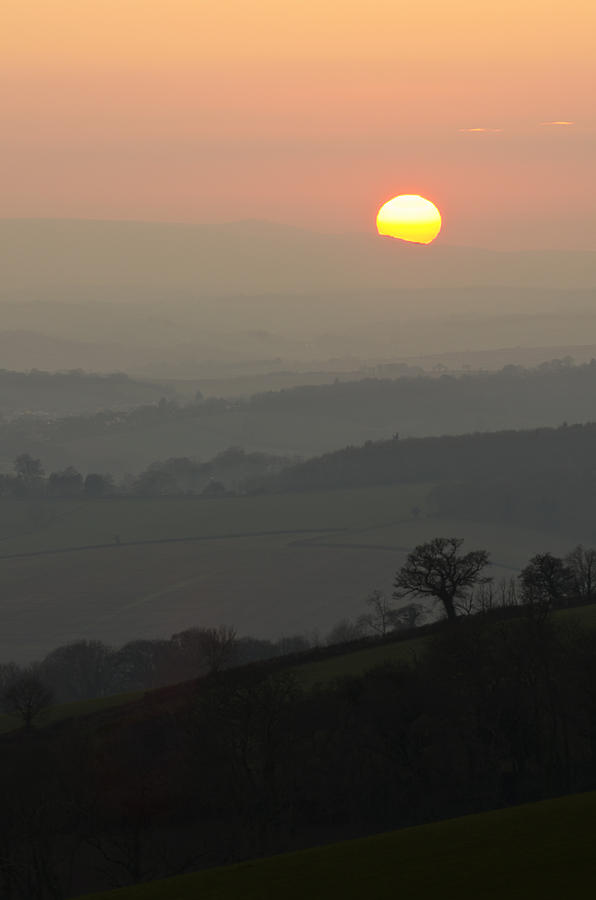 Sunset over the hills Photograph by Pete Hemington