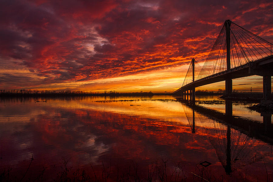 Sunset over the Mississippi River Photograph by Garry McMichael