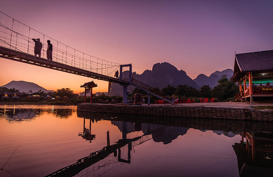 Sunset over the Nam Song River in Vang Vieng, Laos Photograph by Philippe Marion