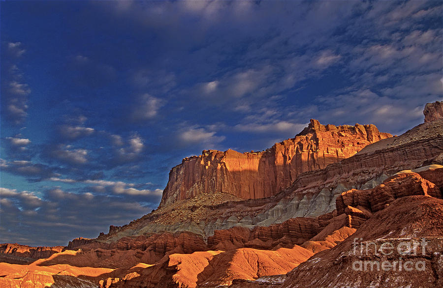 Sunset Over the Waterpocket Fold Capitol Reef National Park Photograph by Dave Welling