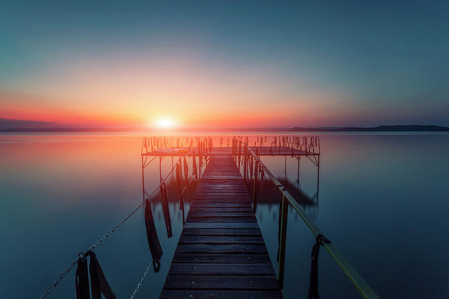 Sunset Over Water Photograph by Focusstock