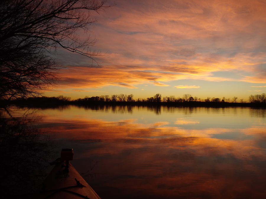 Sunset paddle Photograph by James Peterson
