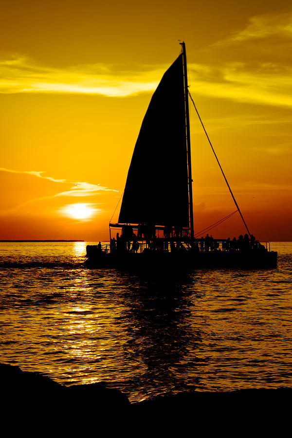 Nature Photograph - Sunset Party Boat by Vaughn Garner