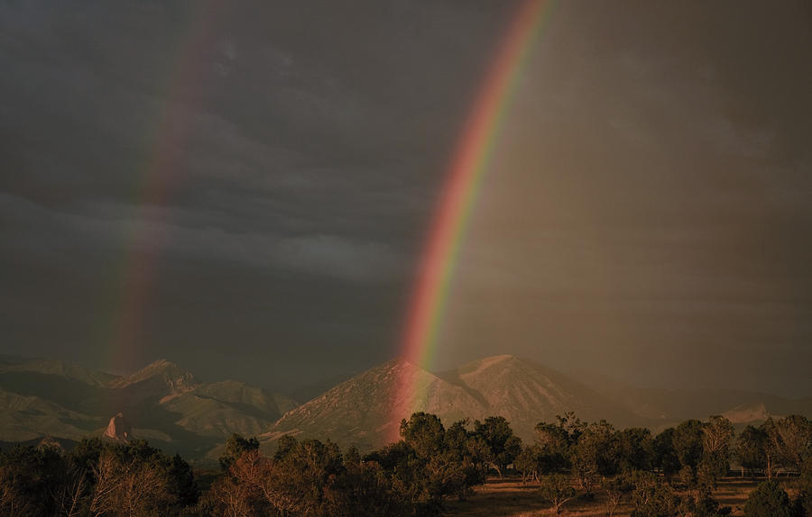 Sunset Rainbow Left Photograph by Eric Rundle
