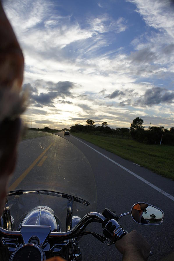 Sunset Ride Photograph by Laurie Perry