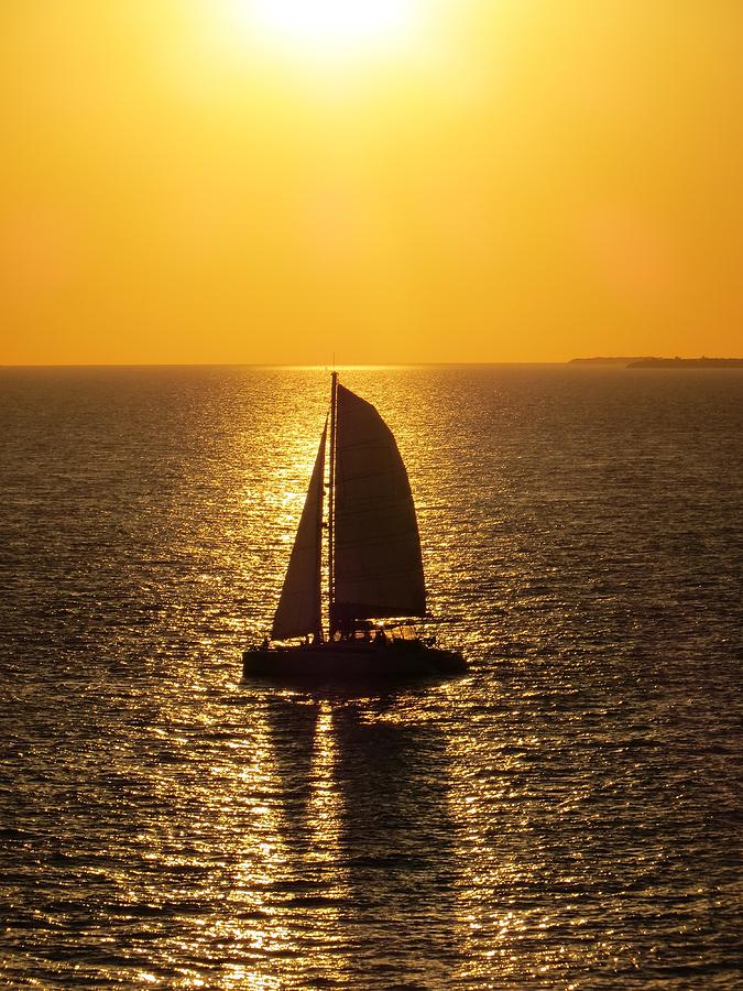 Sunset Sail Photograph by Jennifer Wheatley Wolf