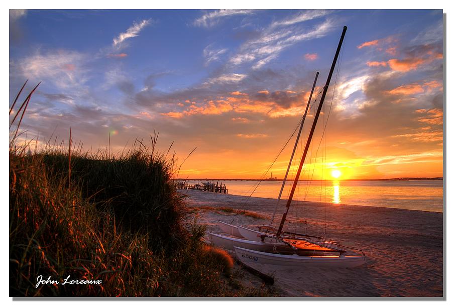 Sunset Sailboat Photograph by John Loreaux