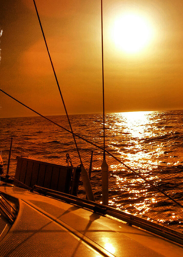 Sunset Photograph - Sunset sailing by Ernesto Cinquepalmi