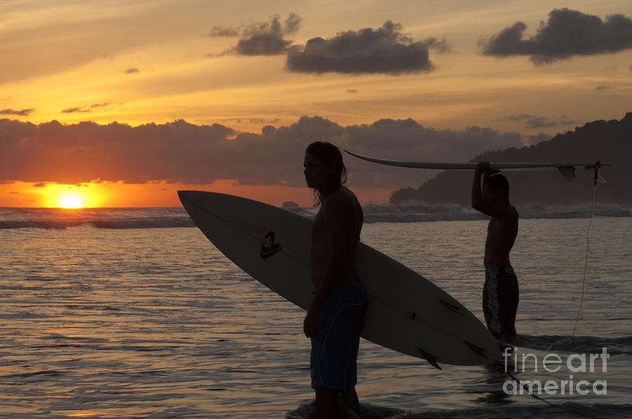 Sunset Surfers Corcovado Costa Rica 2 Photograph by Bob Christopher