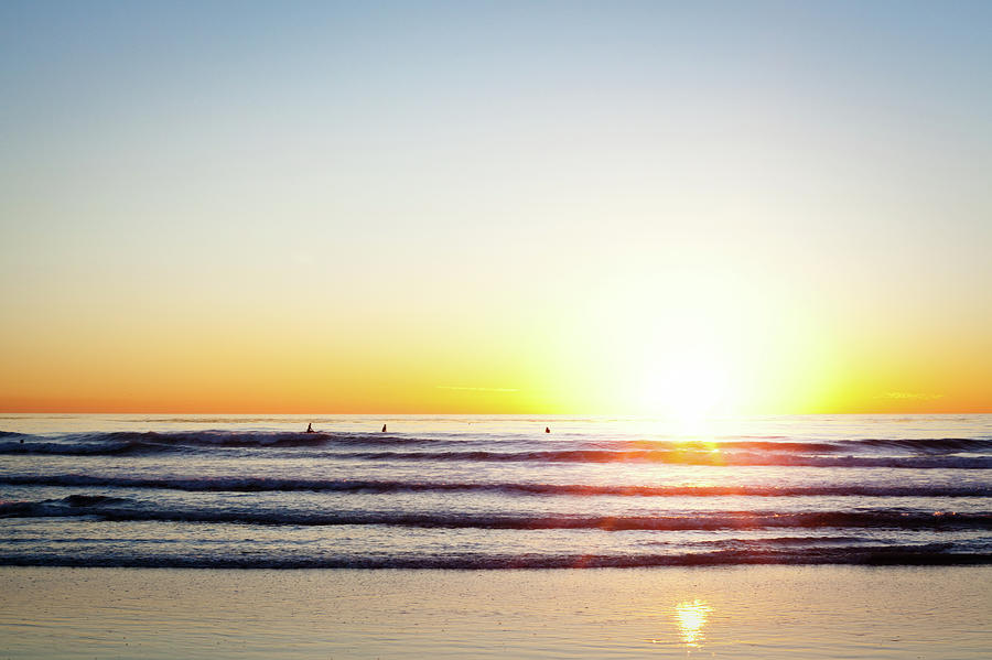 Sunset Surfers Photograph by Ianmcdonnell