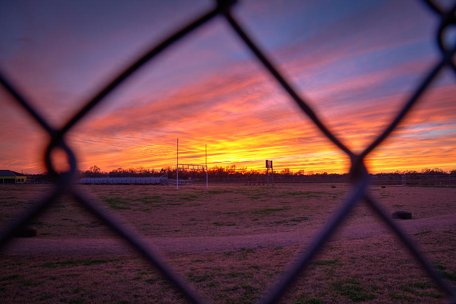 Sunset Through the Fence Photograph by Tim Stanley