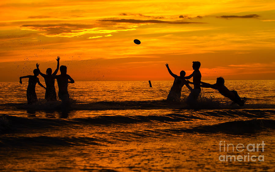 Sunset Water Football Photograph by Anne Kitzman