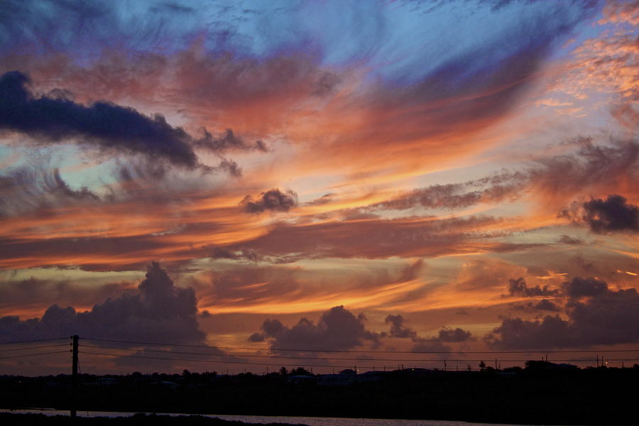 Sunset with feathers in the sky Photograph by Jennifer Lamanca Kaufman ...