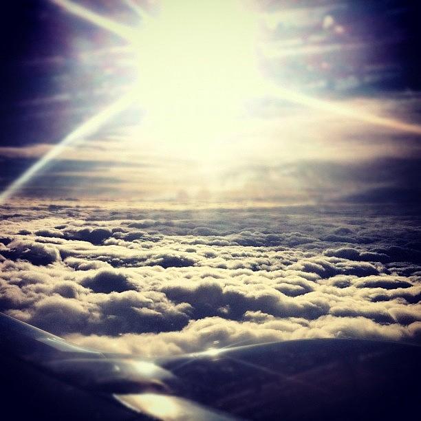High Photograph - Sunshine from a Plane by James McCartney