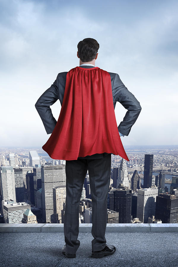 Superhero Businessman Wearing Red Cape Looking At Big City Photograph by Dny59