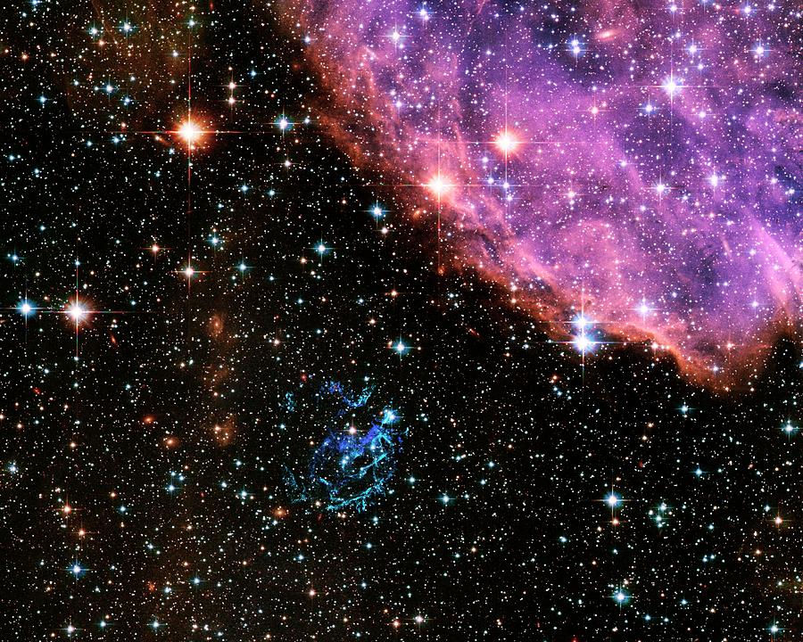 Supernova Remnant E0102 And N 76 Photograph by Nasa/esa/hubble Heritage Team/stsci/aura/science Photo Library