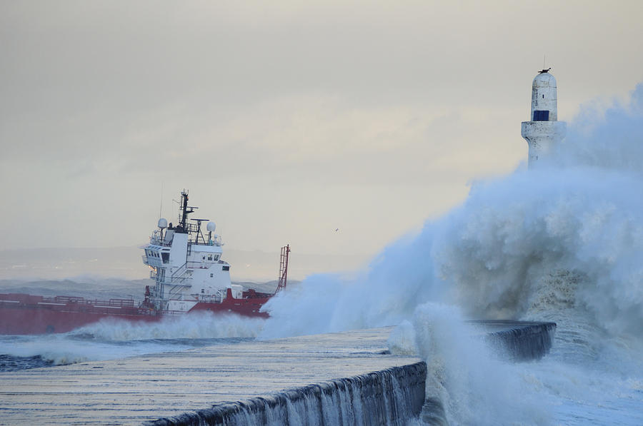 Supply boat leaving Aberdeen on a stormy day Photograph by Abzee