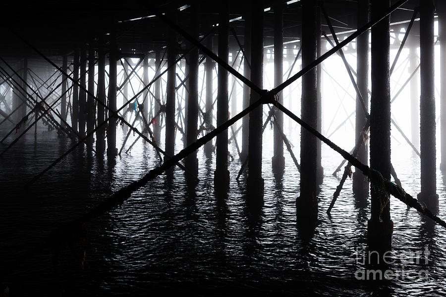 supports under South Parade Pier  at Portsmouth Photograph by Peter Noyce