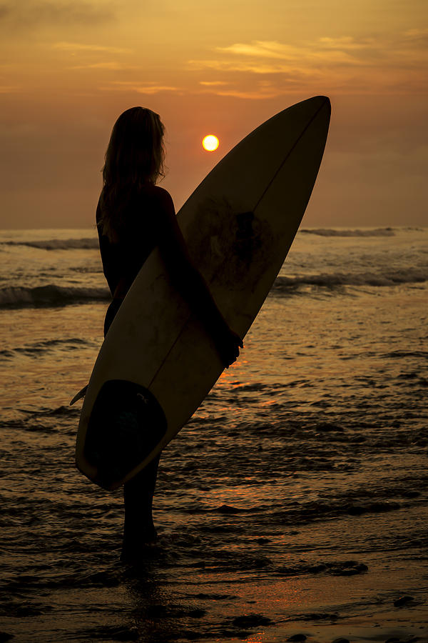 Surfer Girl Sunset Silhouette Photograph by Lee Kirchhevel