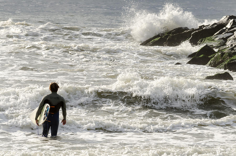 Surfer Heading Out Rockaway Beach Photograph by Maureen E Ritter