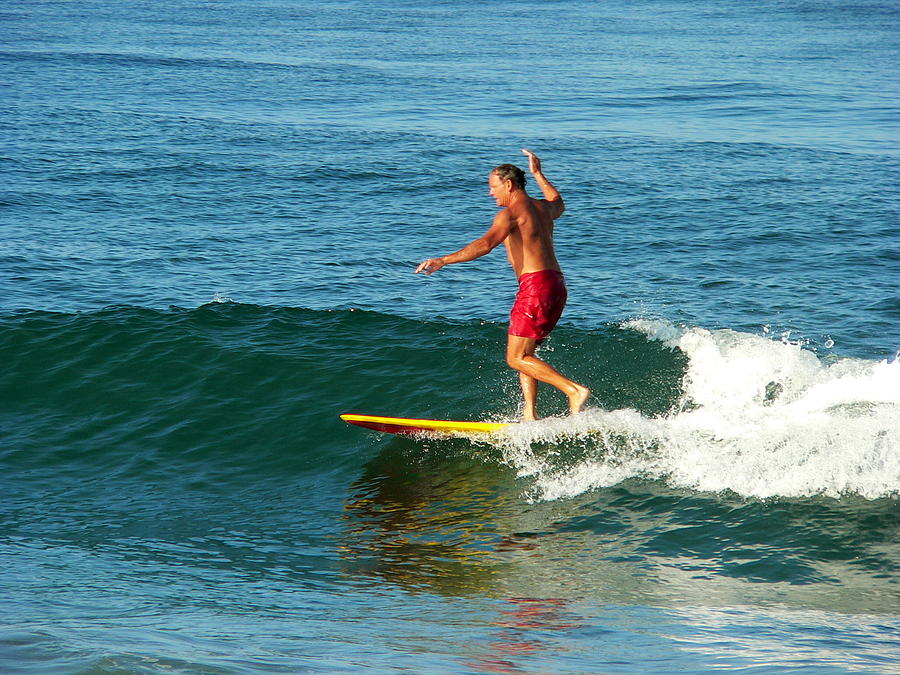Surfer Posing On Board Photograph by Jeff Lowe