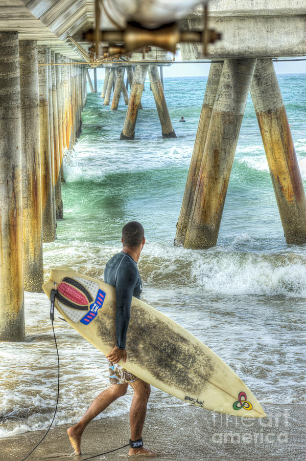 Surfer Under the Pier  Photograph by David Zanzinger