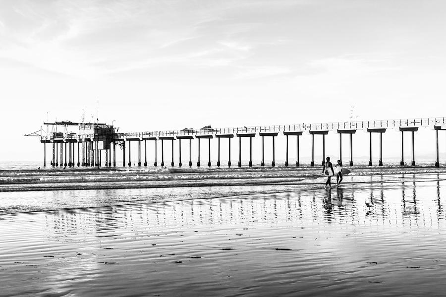 Surfers At La Jolla Shores Beach Black And White Photograph by Priya Ghose