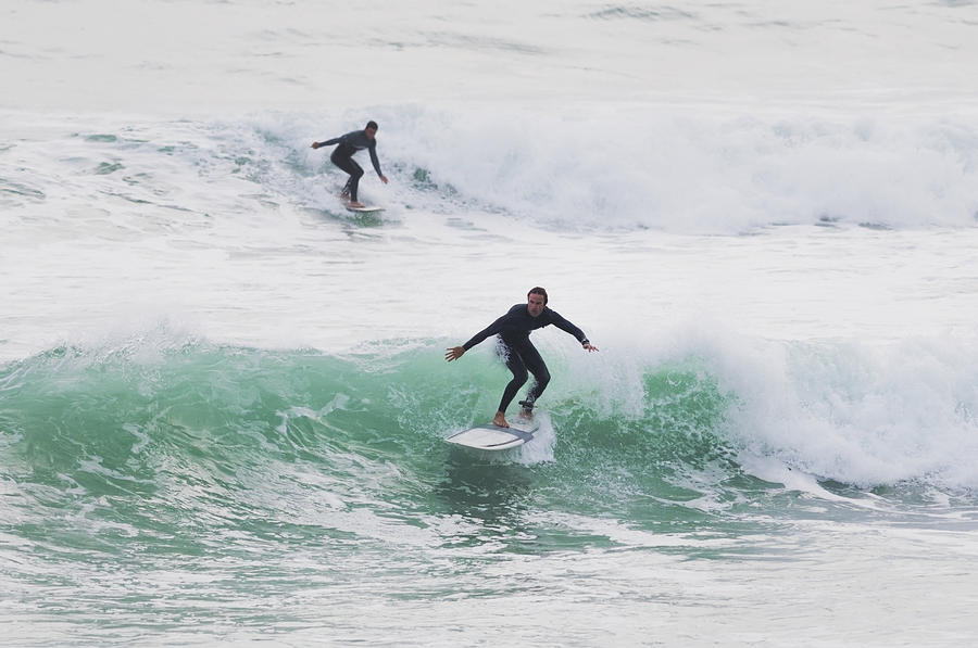 Sports Photograph - Surfers Riding Waves Tarifa, Costa De by Ben Welsh