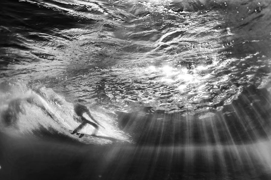 Surfing God light Photograph by Sean Davey