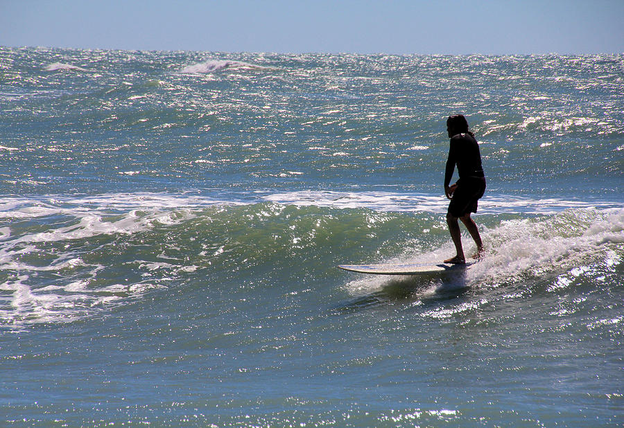 Surfing on the Gulf of Mexico Photograph by Rosalie Scanlon