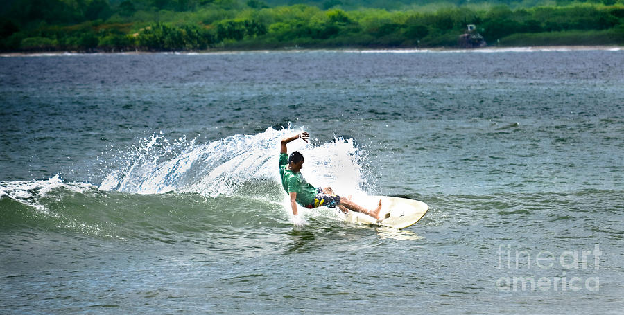 Surfing Tamarindo Photograph by Gary Keesler