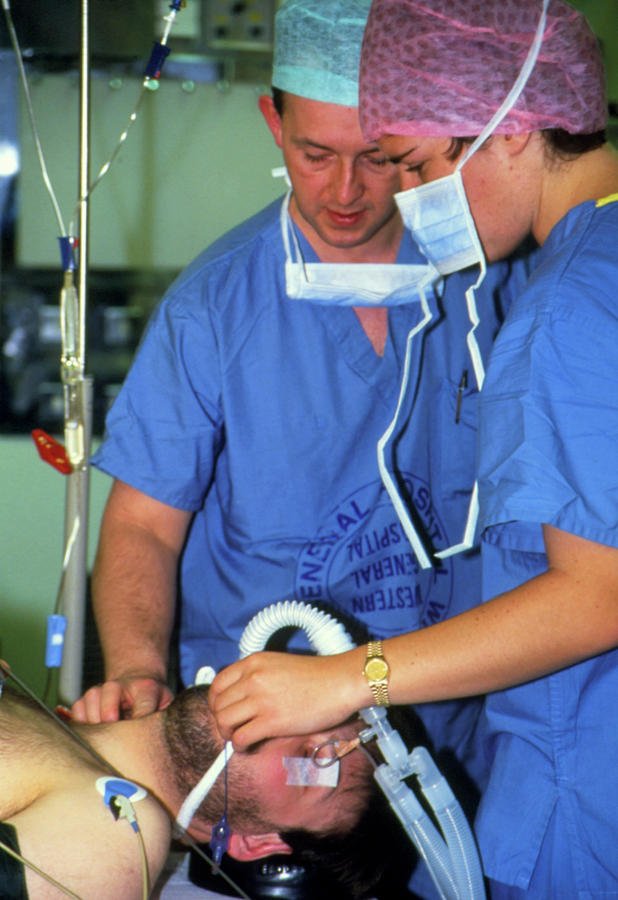 Carotid Artery Photograph - Surgeons Checking A Male Patient Prior To Surgery by Antonia Reeve/science Photo Library
