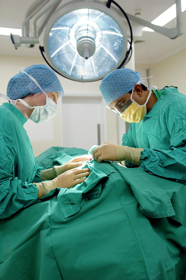 Surgeons Operating Photograph By Jim Varney Science Photo Library Pixels