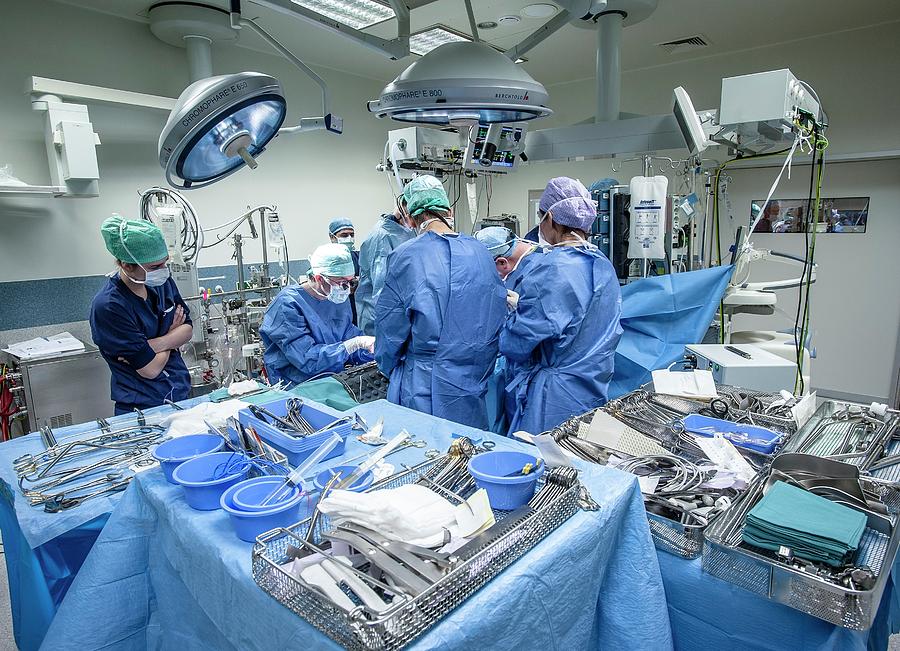 Device Photograph - Surgical Team Operating by Arno Massee