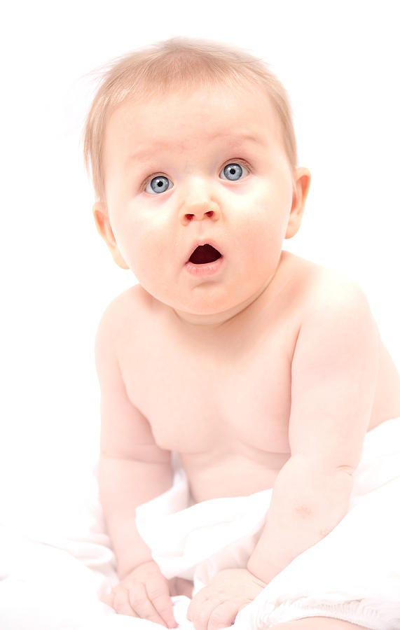 Surprised baby on white Photograph by Photography by Aurimas Adomavicius